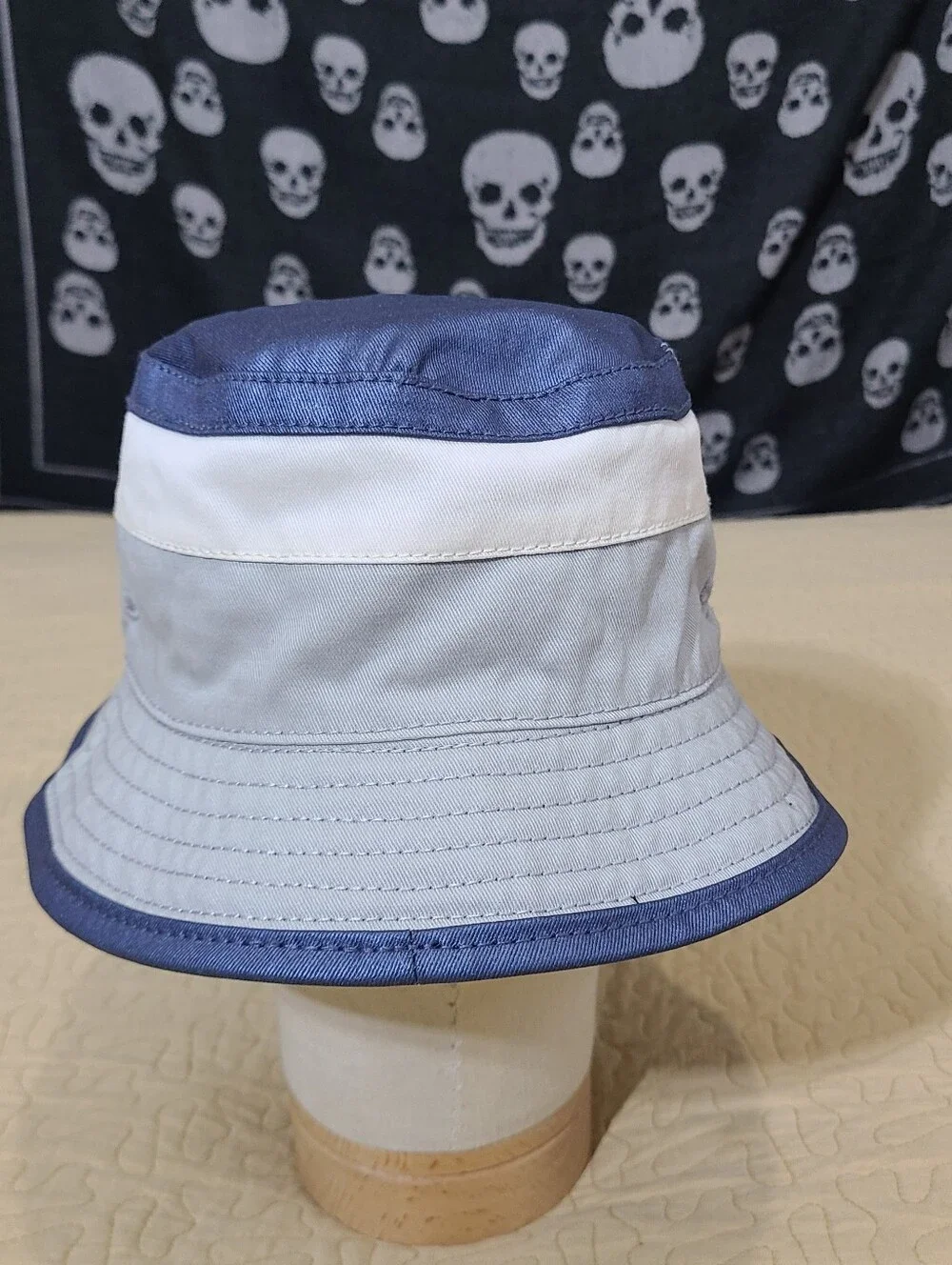 True Religion reversible embroidered logo bucket hat.